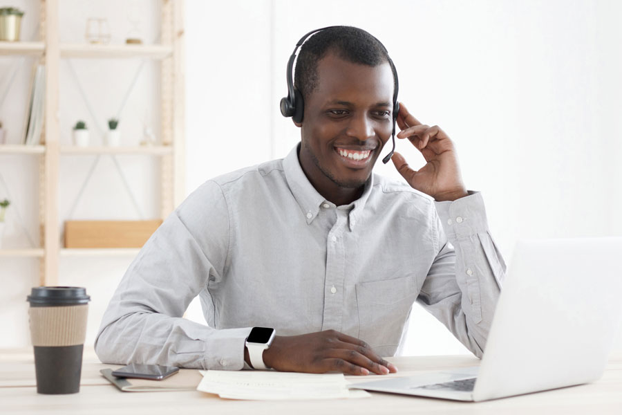 smiling-african-customer-support-service-operator